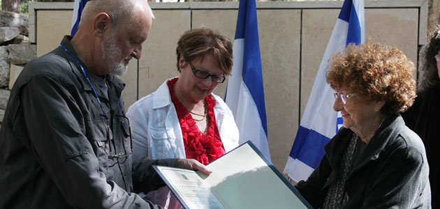 The presentation of the medal and certificate of honor to Françoise Criou and Reuven Kagan, the children of Righteous Among the Nations Yves Criou
