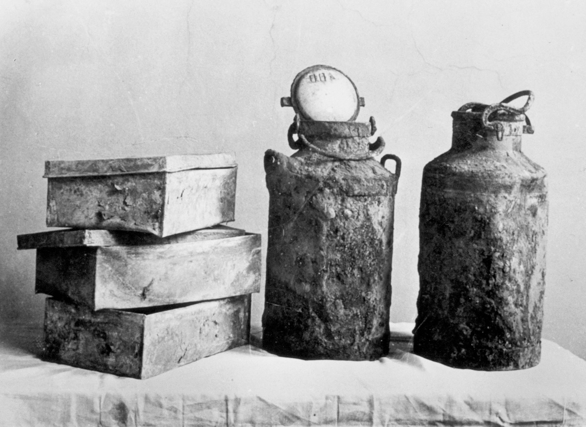 Metal boxes and milk cannisters in which parts of the Oneg Shabbat Archive were hidden, Warsaw, Poland