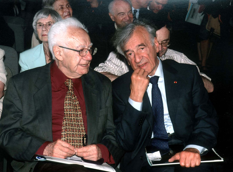 Prof Gutman and Elie Wiesel attending a conference in Auschwitz