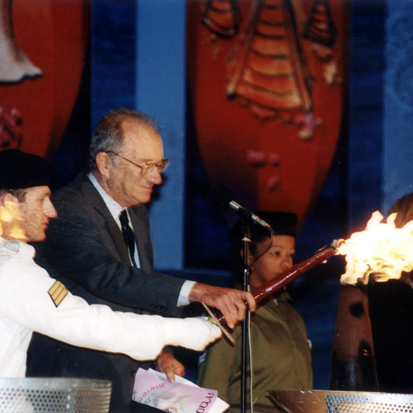 Haim Roet lighting a torch on Israel Independence Day 2001