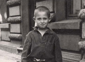 Baruch, a boy who was hidden by Christians, and returned to Jews after the war by the “Co-Ordinazia” organization – Lodz, Poland, Postwar