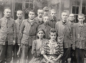 Jewish prisoners posing for a photograph after the liberation – Dachau, Germany, 1945