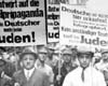 Кельн, Германия, 1933. Штурмовики заставляют евреев нести антисемитские плакаты.