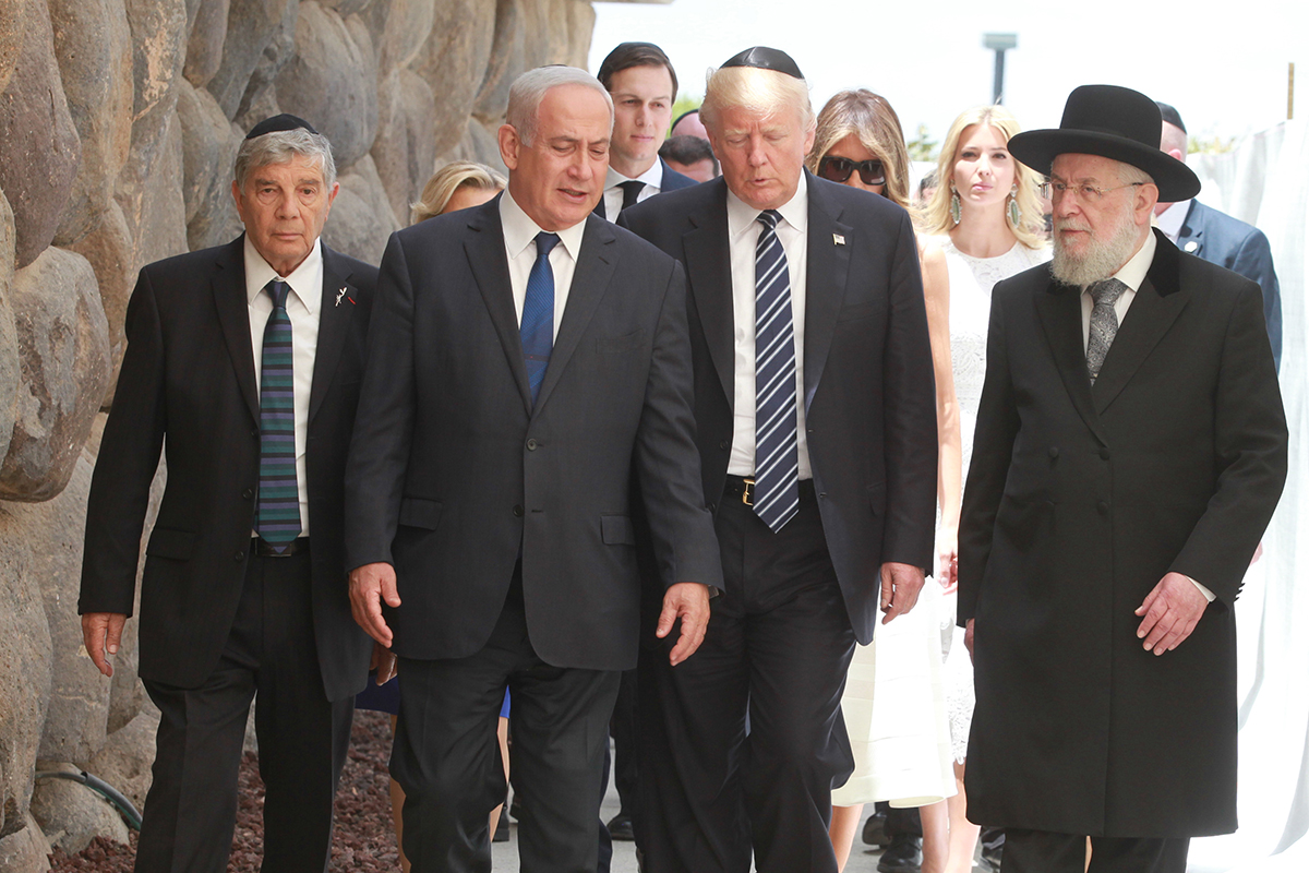 President Donald J. Trump arrives at Yad Vashem accompanied by  (left to right) Avner Shalev, Chairman of the Yad Vashem Directorate , Prime Minister Benjamin Netanyahu and Rabbi Israel Meir Lau, Chairman of the Yad Vashem Council 